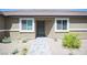 Charming home featuring a walkway to the front door, and desert landscaping at 7890 Aurora Sky St # 1, North Las Vegas, NV 89084