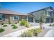 Charming single-story home featuring desert landscaping and a two-car garage at 7890 Aurora Sky St # 1, North Las Vegas, NV 89084
