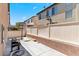Spacious backyard with a grill, basketball hoops, and a privacy fence ideal for outdoor activities and entertaining at 8059 Wards Ferry St, Las Vegas, NV 89139