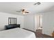 Bedroom with neutral walls and wood floors, features an archway to the bathroom at 8059 Wards Ferry St, Las Vegas, NV 89139