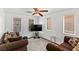 Cozy living room featuring a comfortable seating area, natural light, and modern decor at 8059 Wards Ferry St, Las Vegas, NV 89139