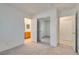 View of a bedroom with closet and bathroom access at 8824 Charm Canyon Ave, Las Vegas, NV 89178