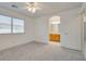 Bedroom boasts a window and a view into the bathroom at 8824 Charm Canyon Ave, Las Vegas, NV 89178