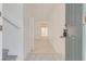 Bright foyer featuring tile flooring, and a view into an open floorplan at 8824 Charm Canyon Ave, Las Vegas, NV 89178