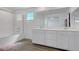 Bathroom with double sinks and a pristine glass-enclosed shower at 96 Campbelltown Ave, Henderson, NV 89015