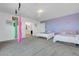 Bedroom with a unique swing and two beds, creating a fun and relaxing space at 96 Campbelltown Ave, Henderson, NV 89015