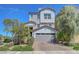 Charming two-story home with a two car garage, manicured landscaping, and inviting curb appeal at 96 Campbelltown Ave, Henderson, NV 89015