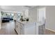 This kitchen features white cabinets, granite countertops and an island at 96 Campbelltown Ave, Henderson, NV 89015
