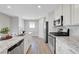 Modern kitchen with stainless steel appliances and granite countertops at 96 Campbelltown Ave, Henderson, NV 89015