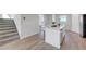 Open kitchen features a large island with a sink at 96 Campbelltown Ave, Henderson, NV 89015