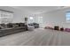 Spacious living room featuring neutral walls, plush carpet, and comfortable seating at 96 Campbelltown Ave, Henderson, NV 89015