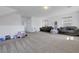 Bright living room featuring neutral walls, plush carpet, and comfortable seating arrangements at 96 Campbelltown Ave, Henderson, NV 89015