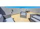 A rooftop patio with outdoor furniture and mountain views at 96 Campbelltown Ave, Henderson, NV 89015