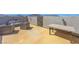 A rooftop patio with mountain views, outdoor furniture and a table at 96 Campbelltown Ave, Henderson, NV 89015