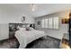 Primary bedroom with a ceiling fan and shuttered windows at , Las Vegas, NV 89118