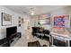 Bedroom featuring tile flooring, ceiling fan, Ansel Adams print, and a vintage pinball machine at , Las Vegas, NV 89118