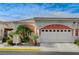 Charming single-story home featuring a two-car garage, well-manicured landscaping, and a desert-friendly yard at , Las Vegas, NV 89118