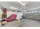 Spacious garage featuring a ceiling fan, overhead lighting, and ample built-in storage cabinets at , Las Vegas, NV 89118