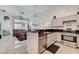 Bright kitchen featuring stainless steel appliances, granite countertops, and a cozy breakfast bar at , Las Vegas, NV 89118