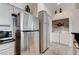 Kitchen featuring stainless steel refrigerator and microwave next to the laundry area at , Las Vegas, NV 89118
