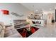 Bright open floor plan featuring vaulted ceilings, neutral decor, and access to the kitchen at , Las Vegas, NV 89118