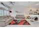 Bright open floor plan featuring vaulted ceilings, neutral decor, and stylish modern furniture at , Las Vegas, NV 89118