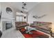 Bright living room featuring vaulted ceilings, a modern fireplace, neutral décor, and ample natural light at , Las Vegas, NV 89118