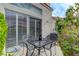 A patio area with patio table and chairs with an air conditioning unit nearby at , Las Vegas, NV 89118