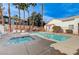 Community pool with a hot tub and lounge chairs at , Las Vegas, NV 89118