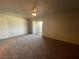 Bright bedroom featuring a ceiling fan and sliding glass door to outdoor balcony at 100 S Crestline Dr # 18, Las Vegas, NV 89107
