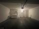 Garage featuring a washing machine, dryer, and storage shelves at 100 S Crestline Dr # 18, Las Vegas, NV 89107