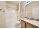 Cozy bathroom featuring a shower and bathtub combination, toilet, vanity with marble countertop at 10001 Peace Way # 2335, Las Vegas, NV 89147