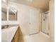 Bathroom featuring a walk-in shower, granite countertops, and modern fixtures at 10001 Peace Way # 2335, Las Vegas, NV 89147