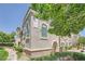 Corner townhome featuring low maintenance landscaping, walkway, and stucco exterior at 10001 Peace Way # 2335, Las Vegas, NV 89147