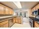 Well-appointed kitchen showcases modern appliances, a stainless steel dishwasher, and stylish finishes at 10001 Peace Way # 2335, Las Vegas, NV 89147