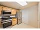 Modern kitchen featuring stainless steel appliances and granite countertops at 10001 Peace Way # 2335, Las Vegas, NV 89147