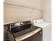 Laundry room showcasing a side-by-side washer and dryer set, and an above wire shelving unit at 10001 Peace Way # 2335, Las Vegas, NV 89147