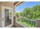 Patio featuring a white metal railing and view of the green scenery at 10001 Peace Way # 2335, Las Vegas, NV 89147