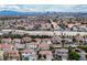 Expansive aerial view of a Las Vegas neighborhood showcasing the community layout and city skyline at 1027 Dawn Valley Dr, North Las Vegas, NV 89031