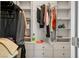 Organized walk-in closet with built-in shelving and ample storage space at 1027 Dawn Valley Dr, North Las Vegas, NV 89031