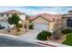 Attractive one-story house with a two-car garage, well-kept yard, and cozy entryway at 1027 Dawn Valley Dr, North Las Vegas, NV 89031