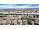 Expansive aerial view of a residential neighborhood, showcasing the rooftops, streets, and landscaping of the community at 1027 Dawn Valley Dr, North Las Vegas, NV 89031