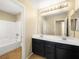 This bathroom features a double sink at 1030 Maple Pines Ave, North Las Vegas, NV 89081