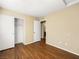 Bedroom with wood floors and a closet at 1030 Maple Pines Ave, North Las Vegas, NV 89081