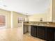 Neutral kitchen features a granite countertop with stainless steel sink at 1030 Maple Pines Ave, North Las Vegas, NV 89081