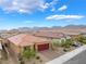 Aerial view of a single-Gathering home with tile roof and desert landscaping at 10943 Artisan Ranch Ave, Las Vegas, NV 89166