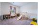 Bright playroom with climbing structure, shelving, and plenty of room to play at 10943 Artisan Ranch Ave, Las Vegas, NV 89166