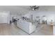 Bright living room with a comfortable sectional sofa, light wood floors and an open concept floorplan at 1117 Azure Heights Pl, Las Vegas, NV 89110