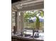 Modern kitchen sink with a scenic outdoor view, enhances everyday tasks with natural light and beauty at 1413 Iron Hills Ln, Las Vegas, NV 89134