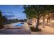 Beautiful backyard pool and patio area, perfect for entertaining or relaxing at 1413 Iron Hills Ln, Las Vegas, NV 89134